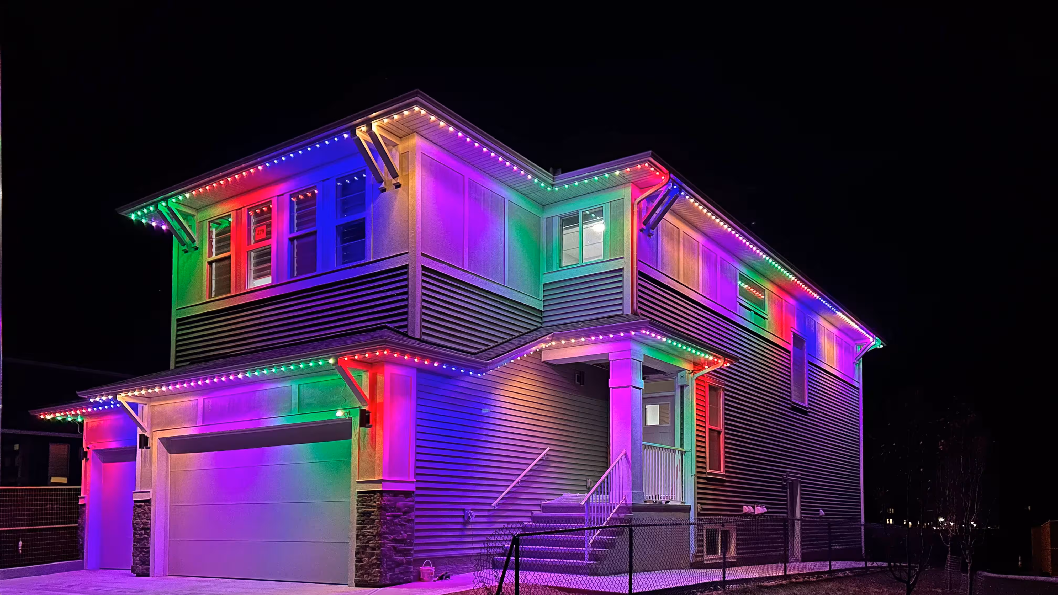 Right side of house with permanent LED lighting